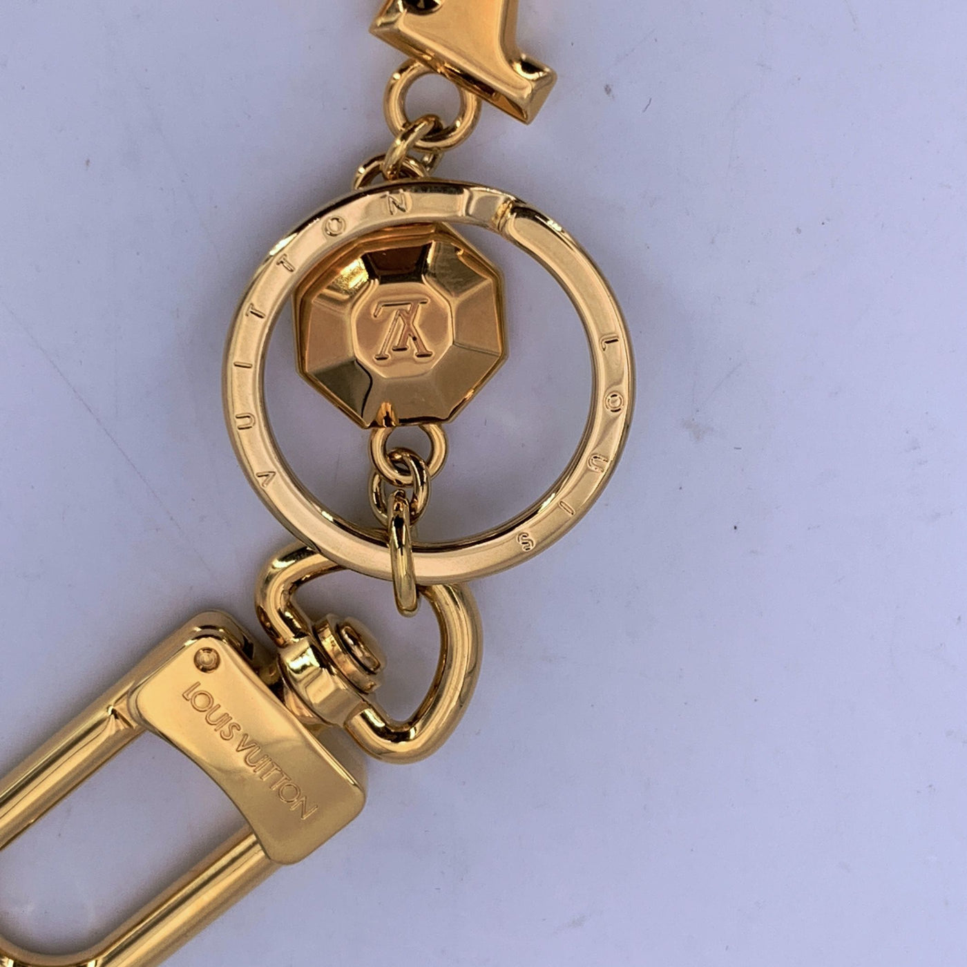 Louis Vuitton Gold Metal Lv Faccettes Keyring Chain Bag Charm
