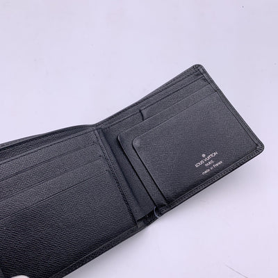 Louis Vuitton Black Taiga Leather Cards and Bill Bifold Wallet