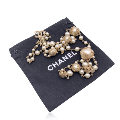 Chanel 06 Faux Pearls Gold Metal CC Logo Long Necklace